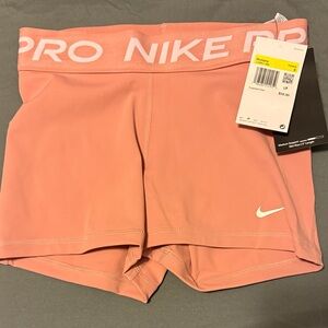 Nike Pro Women's Athletic Shorts in Soft Pink